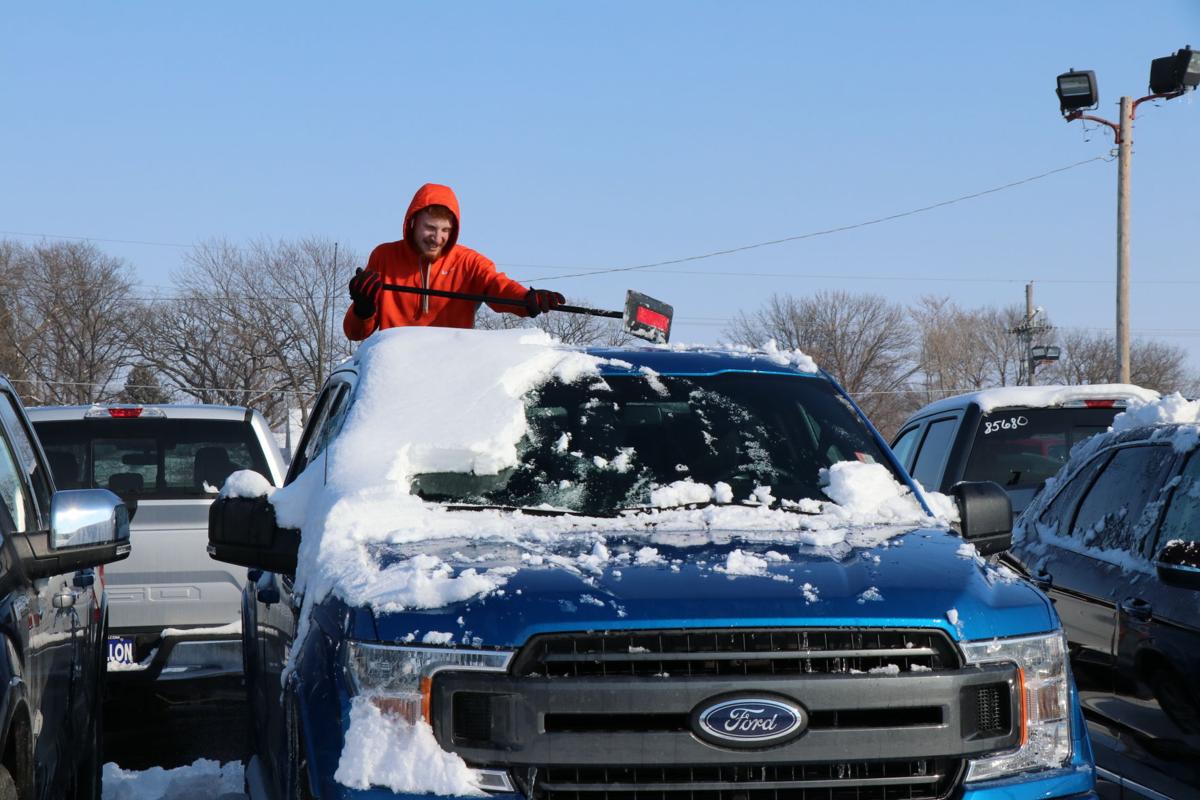 Ford Opens In Wahoo News Ashland Waverly Outside Work Sid Dillon Ford Employee Zac Lamprecht Pushes Snow Off One Of The Vehicles In Lot Wahoo Last Wednesday Afternoon
