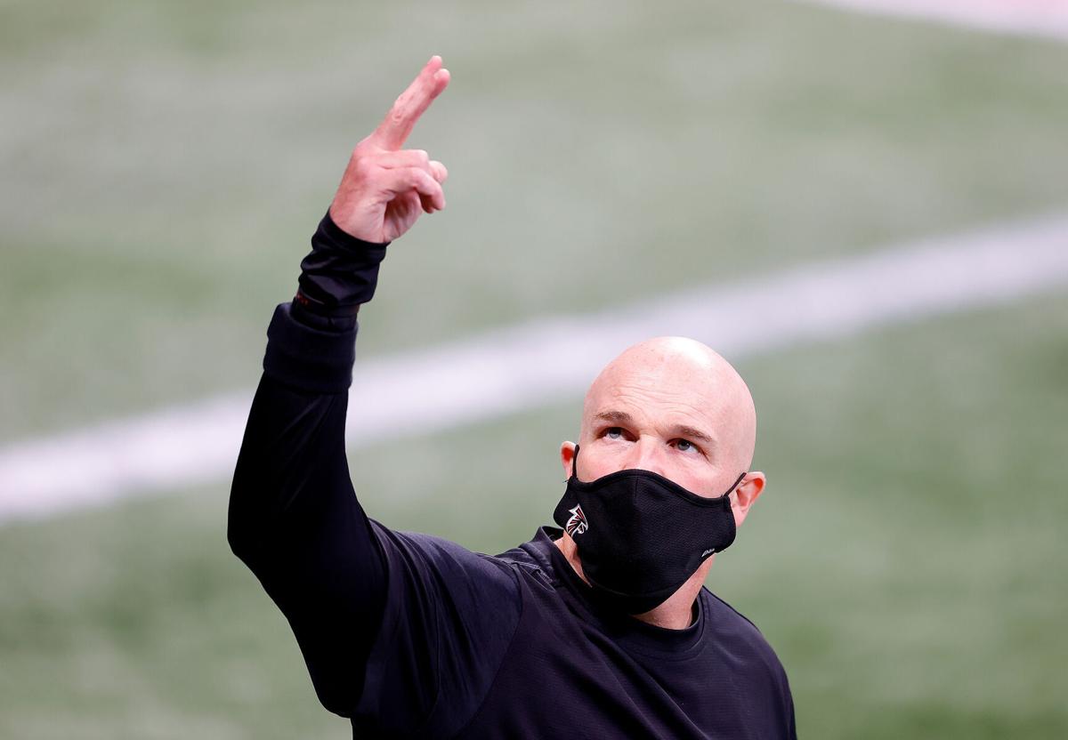 Head coach Dan Quinn of the Atlanta Falcons walks out on the field during pregame warmups prior to facing the Carolina Panthers at Mercedes-Benz Stadium on Oct. 11, 2020 in Atlanta, Georgia.