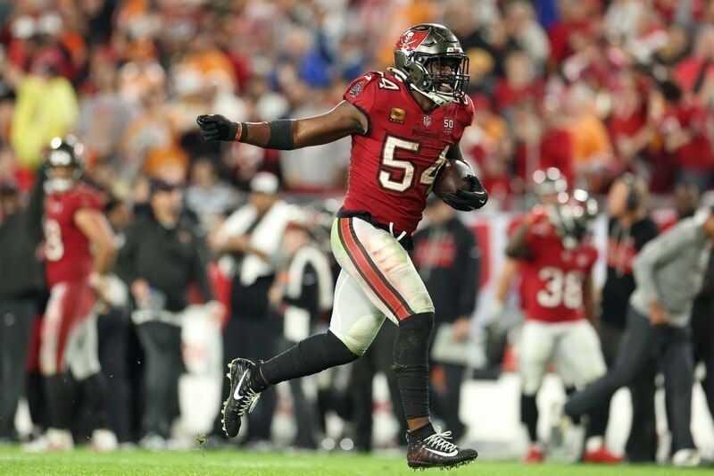 Jan 3, 2026; Tampa, Florida, USA; Tampa Bay Buccaneers linebacker Lavonte David (54) recovers a fumble by the Carolina Panthers in the second half at Raymond James Stadium. Mandatory Credit: Nathan Ray Seebeck-Imagn Images