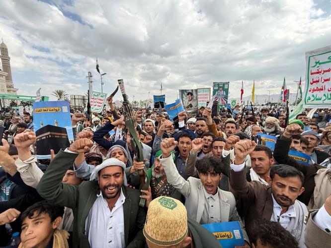 Houthi supporters rally to celebrate advances by Houthi forces along the Red Sea coastline, in Sanaa