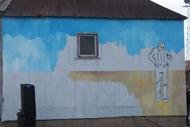 National Tourism Week kicks off with in-progress W. Railway St. mural unveiling