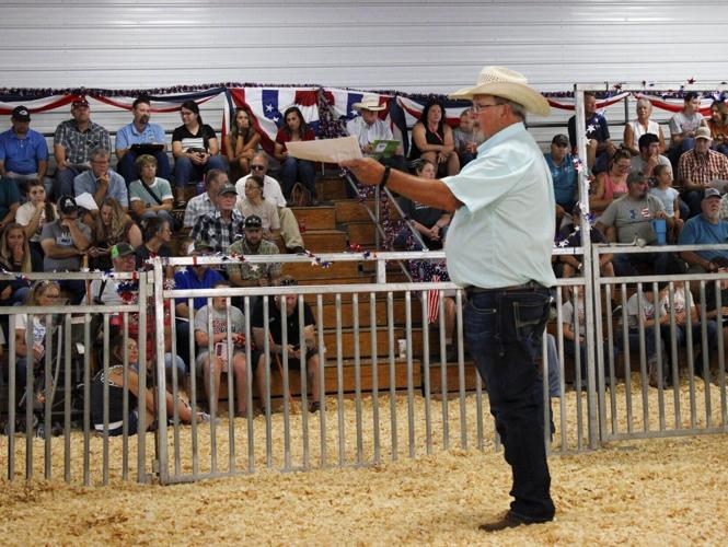 Scotts Bluff County buyers back 4-H and FFA members at annual livestock sale