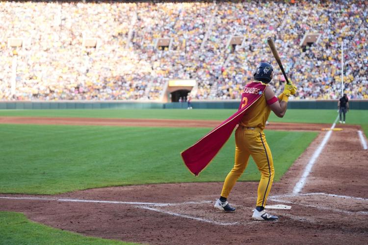 The cape of Reese Alexiades (2) of the Savannah Bananas billows while at bat against the Texas Tailgaters at Neyland Stadium on