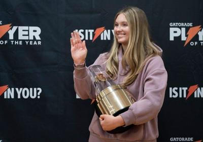 Farmington Hills Mercy High Schoolâ€™s Campbell Flynn, 18, of Rochester Hills has some fun after she was presented with Gatorade Player of the Year for volleyball by surprise visitor, gold medal Olympic volleyball star April Ross on Friday, Jan. 10, 202...