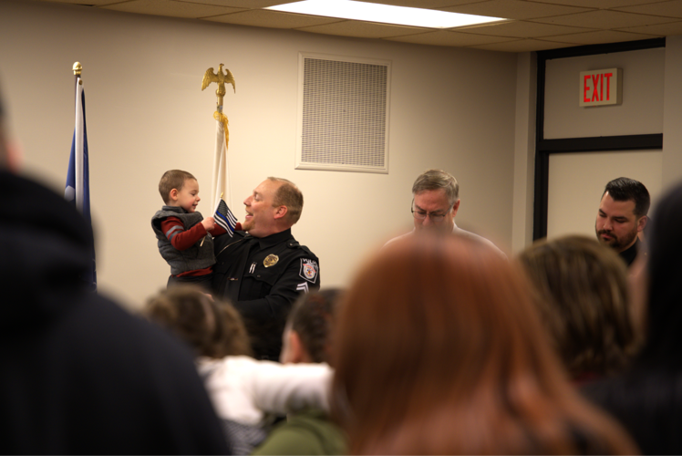 Corporal Bennett smiles at boy