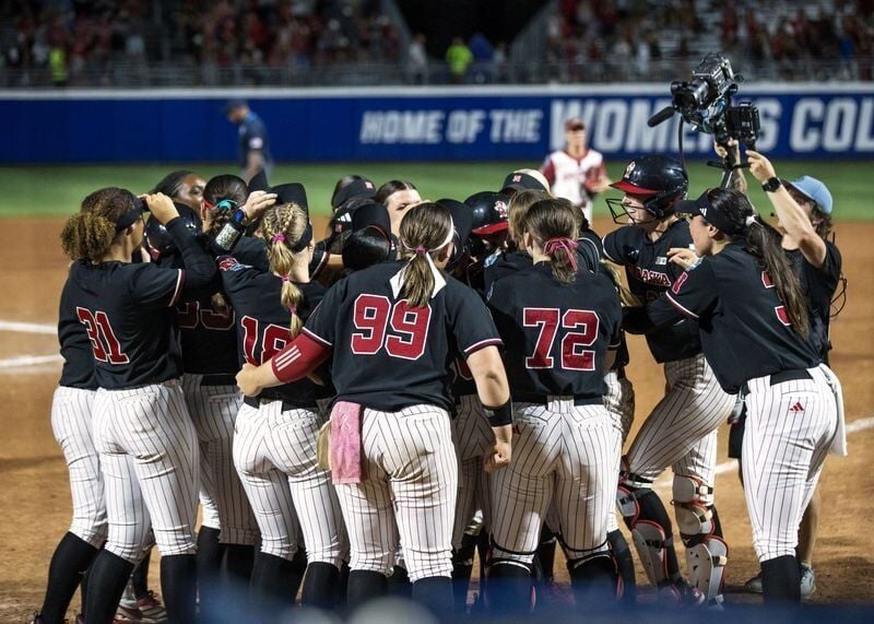 May 28, 2026; Oklahoma City, OK, USA; Nebraska Cornhuskers players celebrate after infielder Ava Kuszak (7) hit a two run home run in the tenth inning to end the game against the Arkansas Razorbacks during the NCAA Women’s College World Series at Devon ...