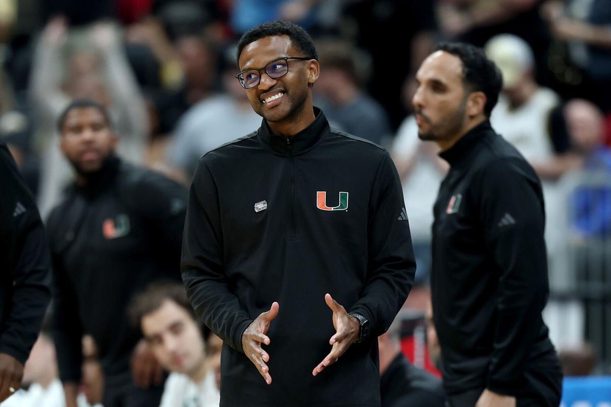 Head coach Jai Lucas of the Miami Hurricanes reacts against the Purdue Boilermakers during the second half in the second round of the 2026 NCAA Men's Basketball Tournament at Enterprise Center on March 22, 2026, in St Louis, Missouri.