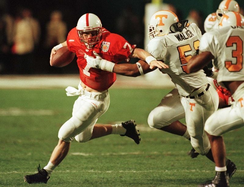 Nebraska's quarterback Scott Frost (7) is brought down for a short gain by Tennessee's defensive tackle Darwin Walker (58) during the second quarter of the Orange Bowl, January 2.

SPORT FOOTBALL
