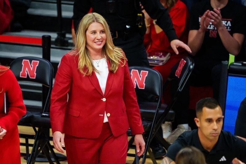 Dec 14, 2025; Lincoln, NE, USA; Nebraska Cornhuskers head coach Dani Busboom Kelly reacts during the first set against the Texas A&M Aggies at Bob Devaney Sports Center. Mandatory Credit: Dylan Widger-Imagn Images