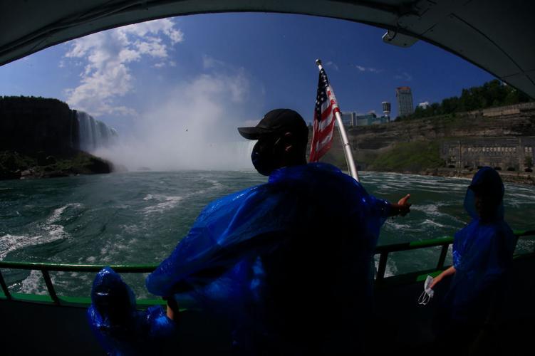 A view of Niagara Falls from the air, by boat and on foot