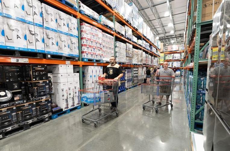 People shop at Costco as it opens in Pensacola on June 25, 2026.