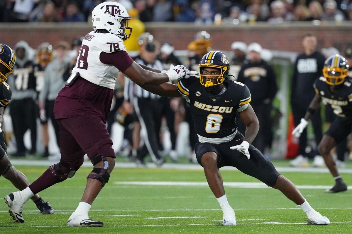 Damon Wilson II of the Missouri Tigers rushes against Dametrious Crownover of the Texas A&M Aggies in the second half at Faurot Field at Memorial Stadium on Nov. 8, 2025, in Columbia, Missouri.