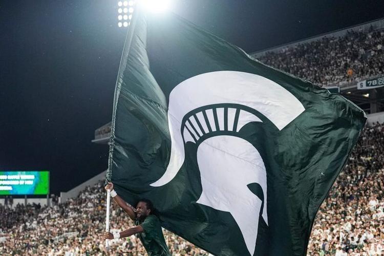 Michigan State spirit squad celebrates a touchdown against Toledo during the first half at Spartan Stadium in East Lansing on Friday, Sept. 4, 2026.