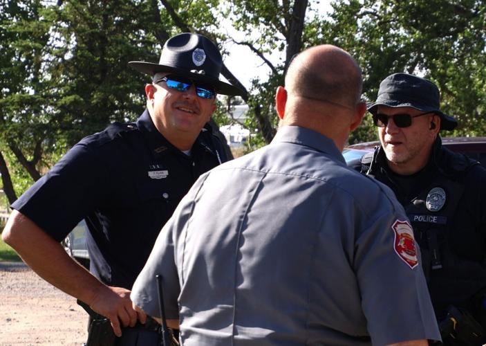 Officers and residents bond over fishing at first Cops and Bobbers event