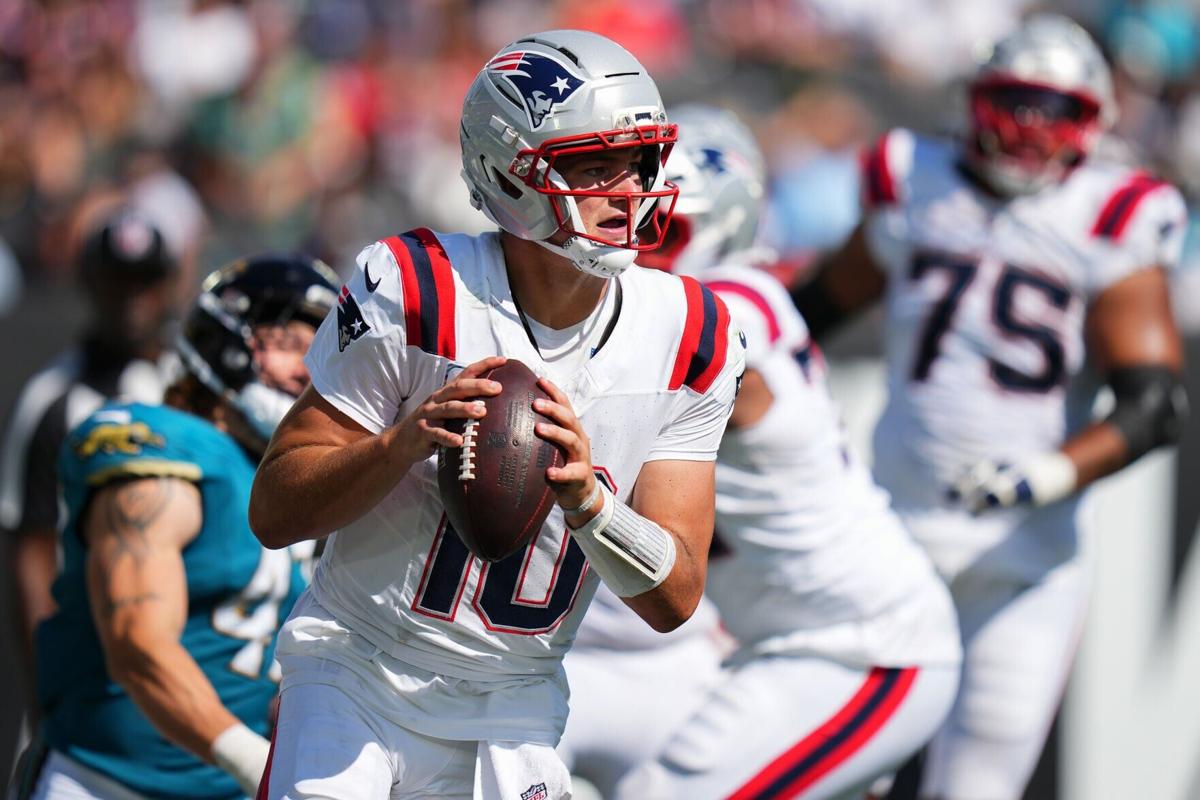 Drake Maye of the New England Patriots scrambles against the Jacksonville Jaguars during the fourth quarter at EverBank Stadium on Sunday, Sept. 27, 2026, in Jacksonville, Fla..