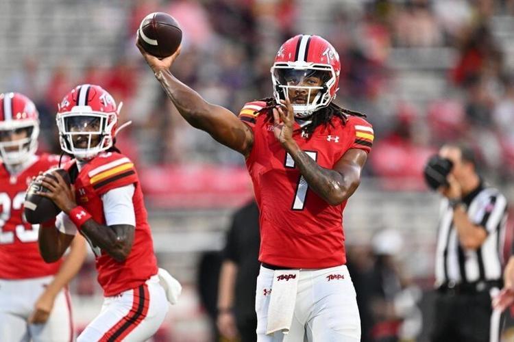 Sep 5, 2026; College Park, Maryland, USA;  Maryland Terrapins quarterback Malik Washington (7) warms up before a game against the Hampton Pirates at SECU Stadium. Mandatory Credit: Jamie Sabau-Imagn Images
