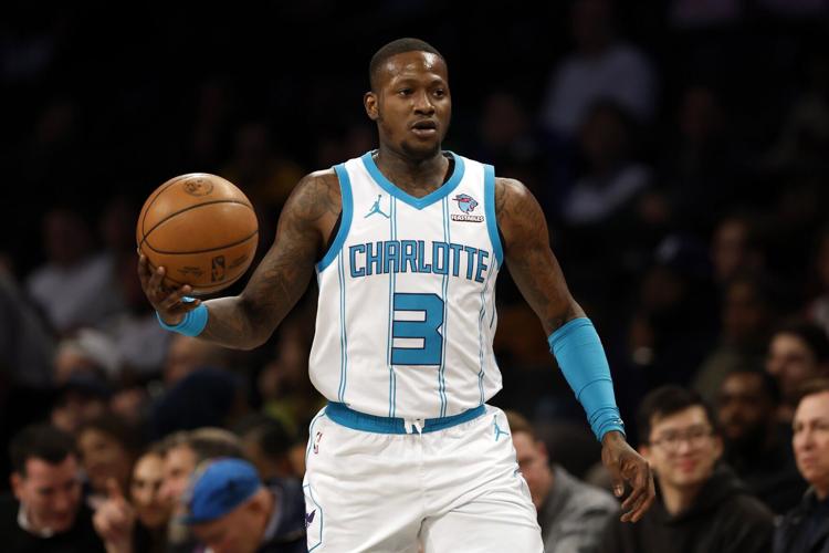 The Charlotte Hornets' Terry Rozier controls the ball during the first half against the Brooklyn Nets at Barclays Center on Nov. 30, 2023, in New York.