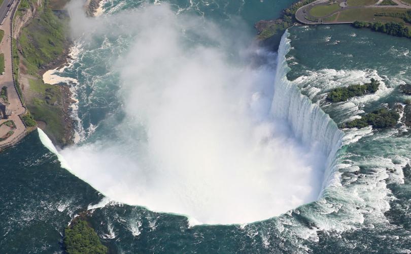 A view of Niagara Falls from the air, by boat and on foot