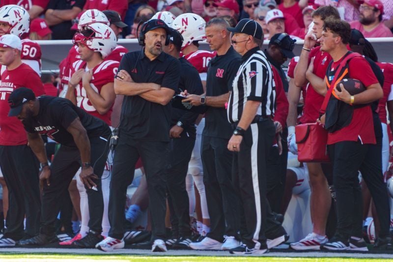Oct 3, 2026; Lincoln, Nebraska, USA;  Nebraska Cornhuskers head coach Matt Rhule talks with a referee during the first quarter against the Maryland Terrapins at Memorial Stadium.  Mandatory Credit: Dylan Widger-Imagn Images