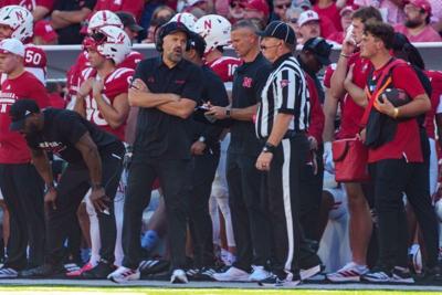 Oct 3, 2026; Lincoln, Nebraska, USA;  Nebraska Cornhuskers head coach Matt Rhule talks with a referee during the first quarter against the Maryland Terrapins at Memorial Stadium.  Mandatory Credit: Dylan Widger-Imagn Images