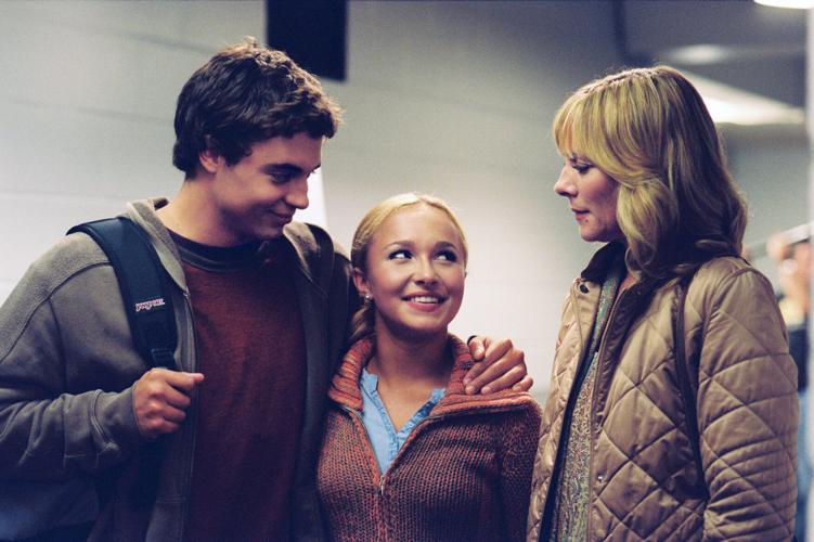 Trevor Blumas, from left, Hayden Panettiere and Kim Cattrall appear in a scene from "Ice Princess."