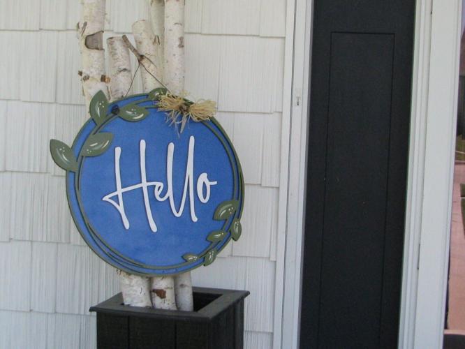 YOM July hello sign