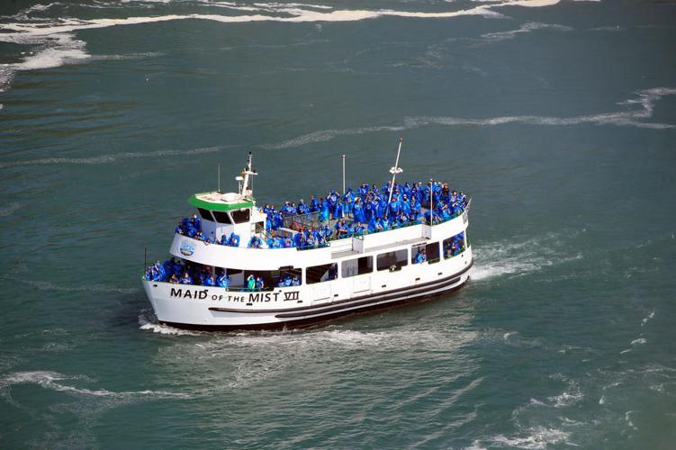 A view of Niagara Falls from the air, by boat and on foot