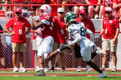Sep 5, 2026; Lincoln, Nebraska, USA;  Nebraska Cornhuskers running back Jamal Rule (25) runs for a touchdown against Ohio Bobcats defensive back Barry Dillon (8) during the second quarter at Memorial Stadium.  Mandatory Credit: Dylan Widger-Imagn Images