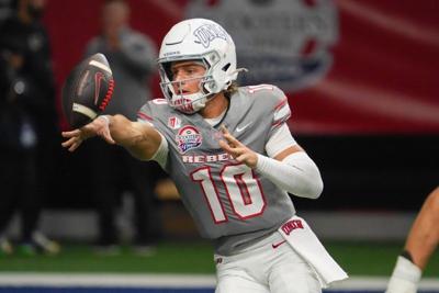Dec 23, 2025; Frisco, TX, USA; UNLV Rebels quarterback Anthony Colandrea (10) pitches the ball against the Ohio Bobcats during the second half at the Ford Center at The Star. Mandatory Credit: Raymond Carlin III-Imagn Images