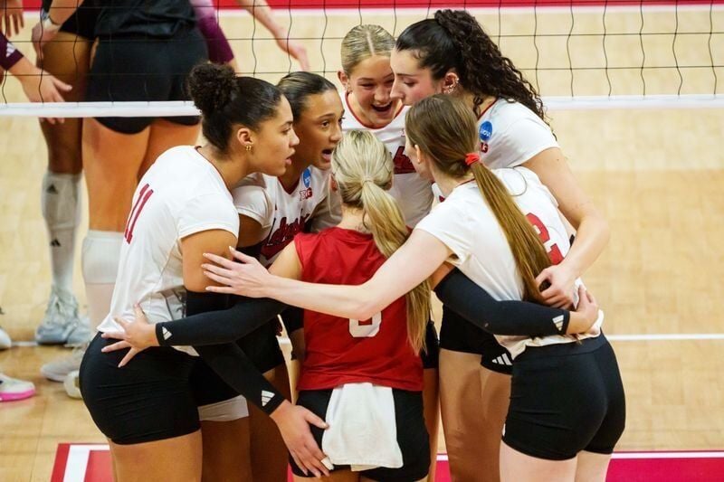 Dec 14, 2025; Lincoln, NE, USA; The Nebraska Cornhuskers react after a point against the Texas A&M Aggies during the second set at Bob Devaney Sports Center. Mandatory Credit: Dylan Widger-Imagn Images