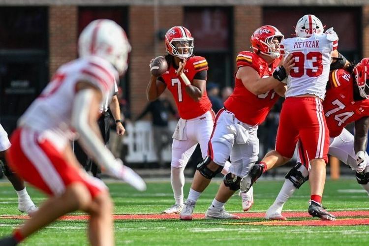 Oct 11, 2025; College Park, Maryland, USA; Maryland Terrapins quarterback Malik Washington (7) throws from the pocket during the first half against the Nebraska Cornhuskers at SECU Stadium. Mandatory Credit: Tommy Gilligan-Imagn Images