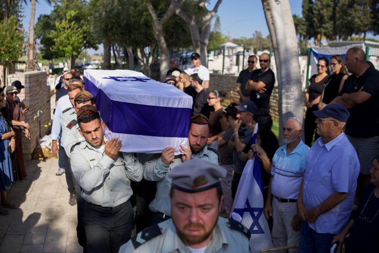 Mourners attend the funeral of Captain David Hazutt an Israeli soldier who, according to the Israeli military, was killed in an encounter with a Hezbollah militant in southern Lebanon, in Ashkelon