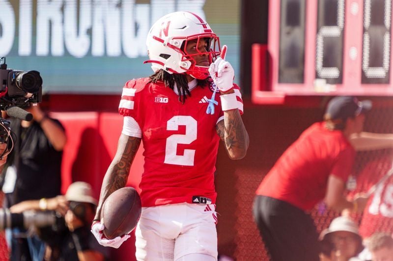 Sep 20, 2025; Lincoln, Nebraska, USA; Nebraska Cornhuskers wide receiver Jacory Barney Jr. (2) reacts after scoring a touchdown against the Michigan Wolverines during the second quarter at Memorial Stadium. Mandatory Credit: Dylan Widger-Imagn Images