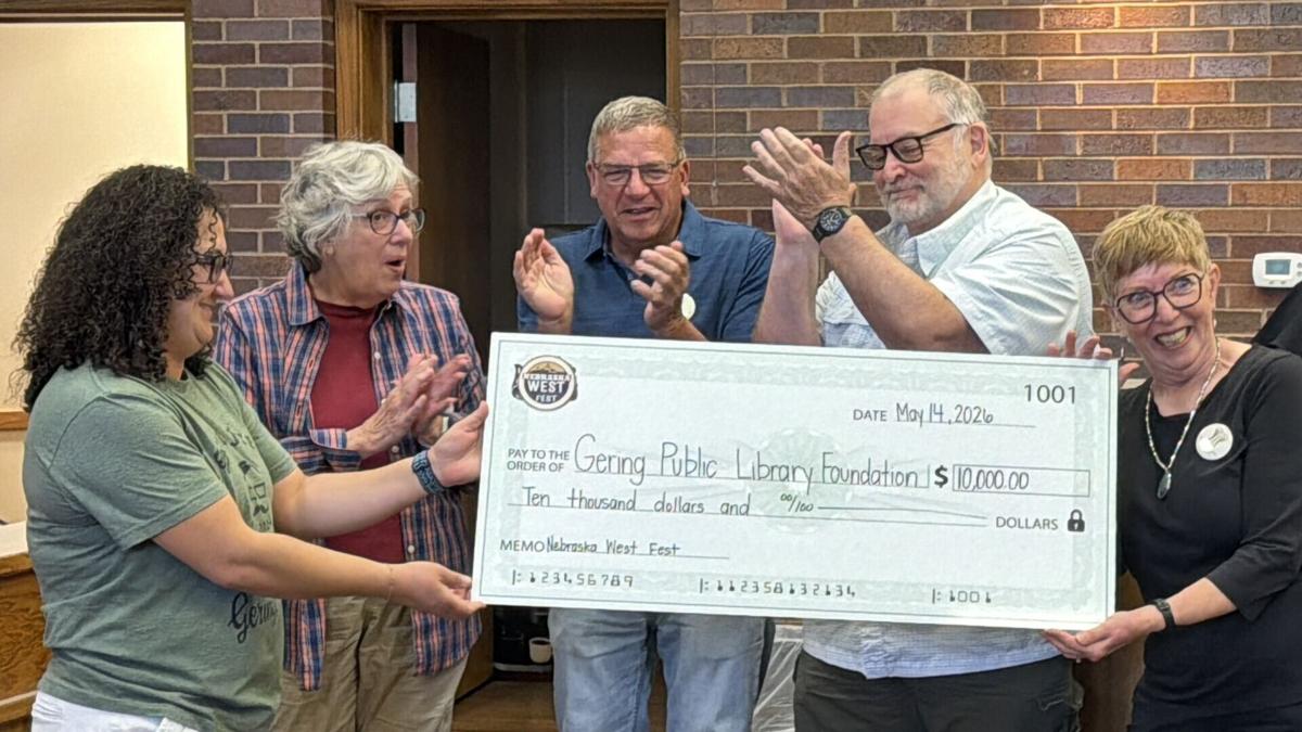 Nebraska West Fest presents $10,000 donation check to Gering Library Foundation