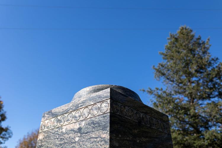 COPYRIGHT RESTRICTED Baseball Statue