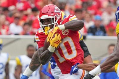 Aug 15, 2026; Kansas City, Missouri, USA; Kansas City Chiefs running back Emmett Johnson (10) runs the ball against the Los Angeles Rams during the first half of the pre season game at Arrowhead Stadium. Mandatory Credit: Denny Medley-Imagn Images