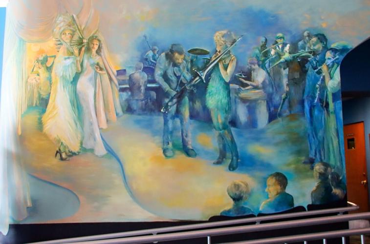 Midwest Theater marks 80 years with deed transfer, mural unveiling