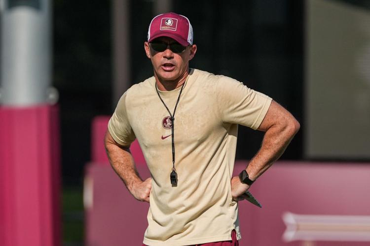 Florida State head coach Mike Norvell watches as players put in work during practice with the first home game just a few weeks
