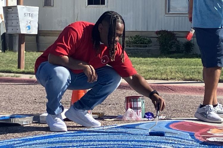ReConnect students expand community service resumes with three new Terrytown crosswalk murals