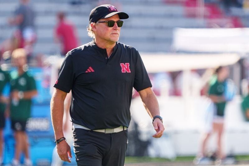 Sep 5, 2026; Lincoln, Nebraska, USA;  Nebraska Cornhuskers offensive coordinator Dana Holgorsen walks on the field during warmups before the game against the Ohio Bobcats at Memorial Stadium.  Mandatory Credit: Dylan Widger-Imagn Images
