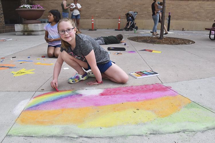 As Chalkfest nears, youth beautify Heritage Square Plaza Local News