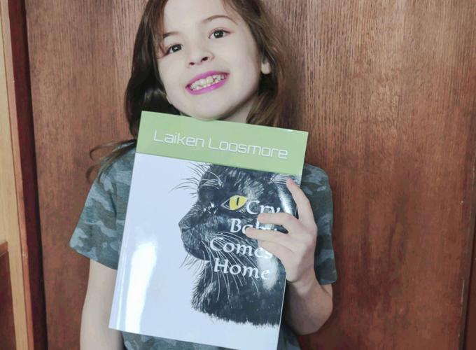 Rosholt 8yearold publishes book about lost and found cat News