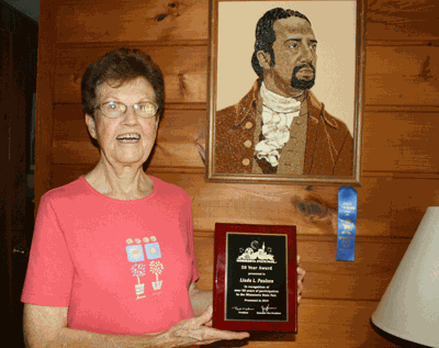 Linda Paulsen of Hackensack brought home a blue ribbon from the State Fair for her Crop Art of Lin-Manuel Miranda.
