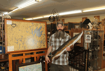 Joel Mensch has owned The Art and Antique Mall and Heritage Custom Framing on main street in downtown Walker for several years, moving to his present location about six years ago.