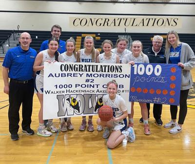 Aubrey Morrison (kneeling in front) hit the 1,000-point milestone last week in WHA’s 71-52 win at Clearbrook-Gonvick.