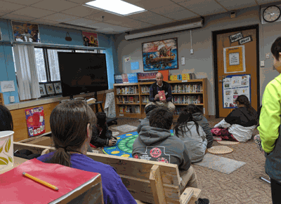 Author Michael Bazzett visited Bug-O-Nay-Ge-Shig School last week and read to some of the students.