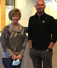 Roxanne Olson is pictured with Bank Forward's Market President Mark Sylstad.