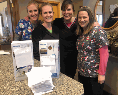 Pictured are dental hygenists (from left) Jackie Diekmann, Kayla Anderson, Jamie Roskamp and Kari Wood.
