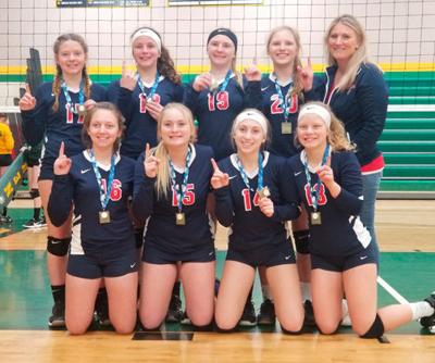 Pictured are (kneeling from left) Ella Dykema, Alexa Johannson, Mackenzie Raddatz, Gwen DeVries, (standing) Paige Nornberg, Aliya Naus, Jessica Sharpnack, Karolyn Oberfell and Coach Vanessa Jacobson.