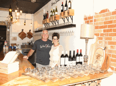 The WineDown Wine Bar owners are Tom Demars and Kim Walters.